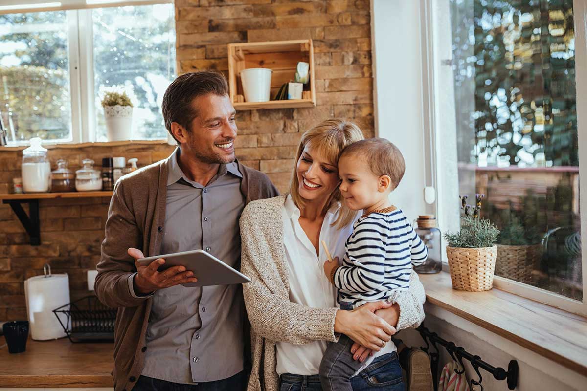 smiling family comfortable in their home